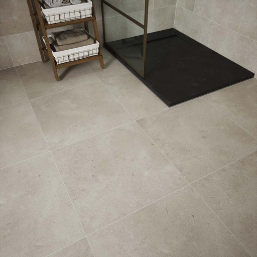 Verona Bloomberg 600x600mm matt porcelain tile with light grey-beige stone effect and delicate veining.