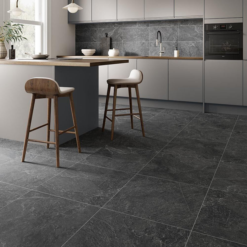 Verona Genesis Anthracite 600x600mm matt porcelain tile with charcoal grey stone-effect markings and fine pale veining.