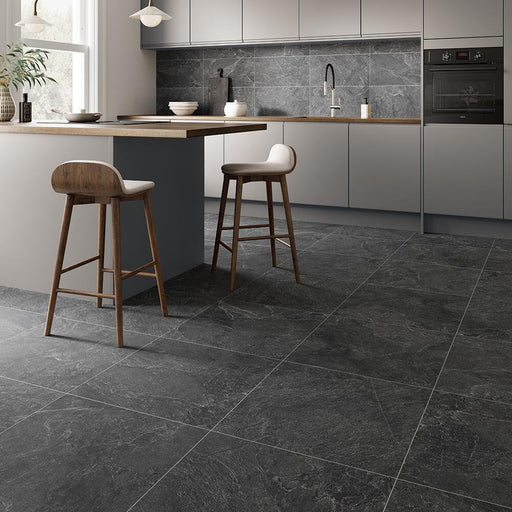 Verona Genesis Anthracite 600x600mm matt porcelain tile with charcoal grey stone-effect markings and fine pale veining.